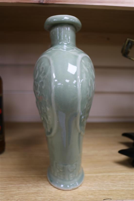 A Chinese celadon glazed vase height 18cm